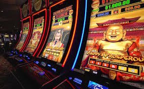 Adventures Beyond Wonderland slot game interface showing five reels and bonus feature symbols